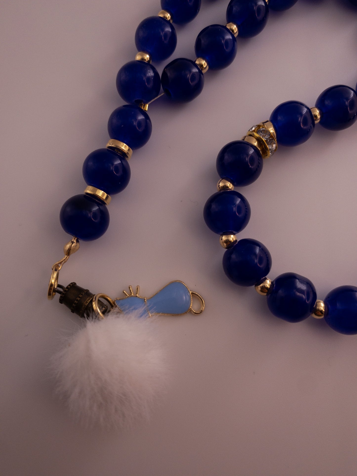 royal blue glass beads sebha with cat and pom pom