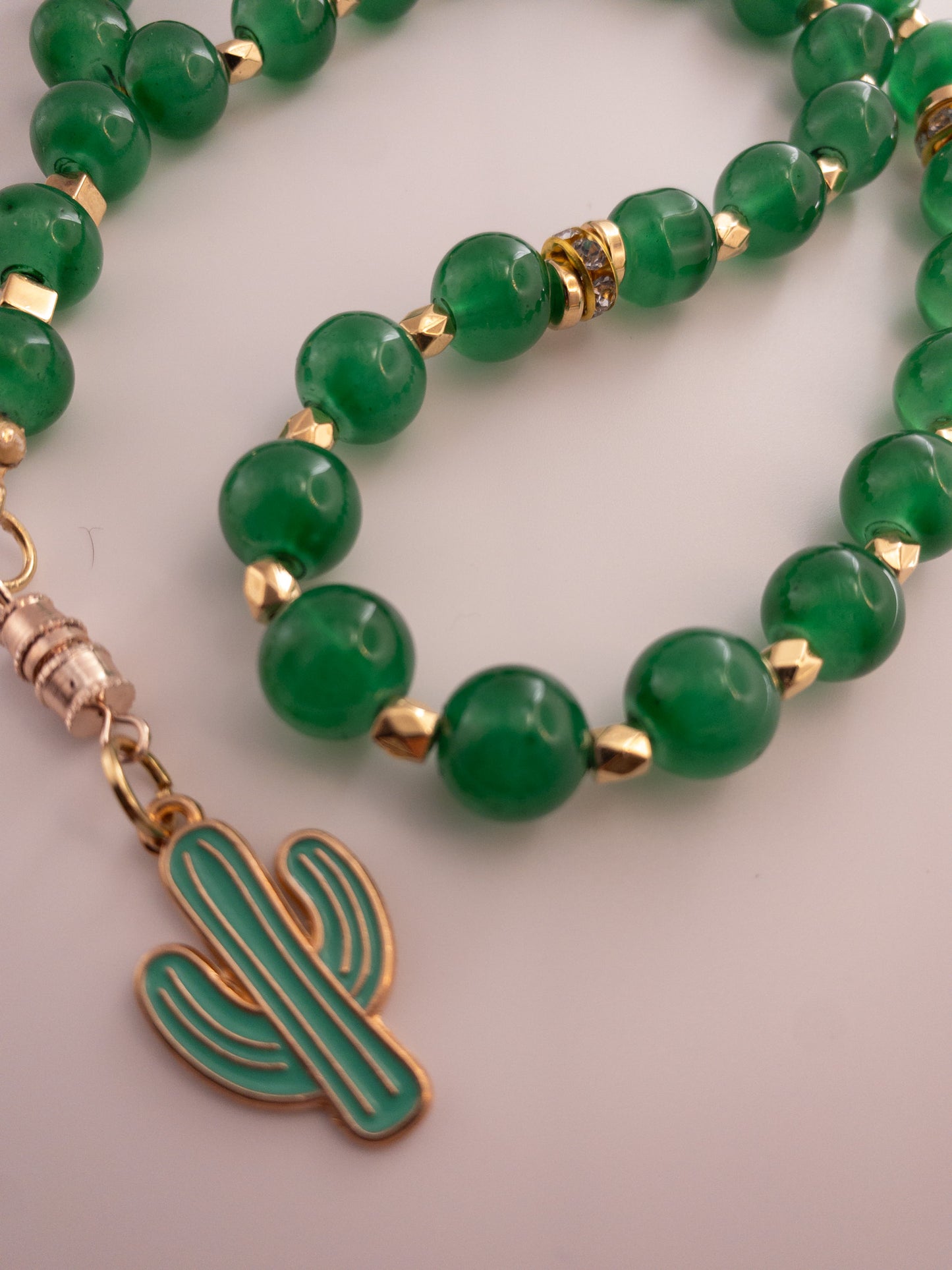 green glass bead sebha with cactus 