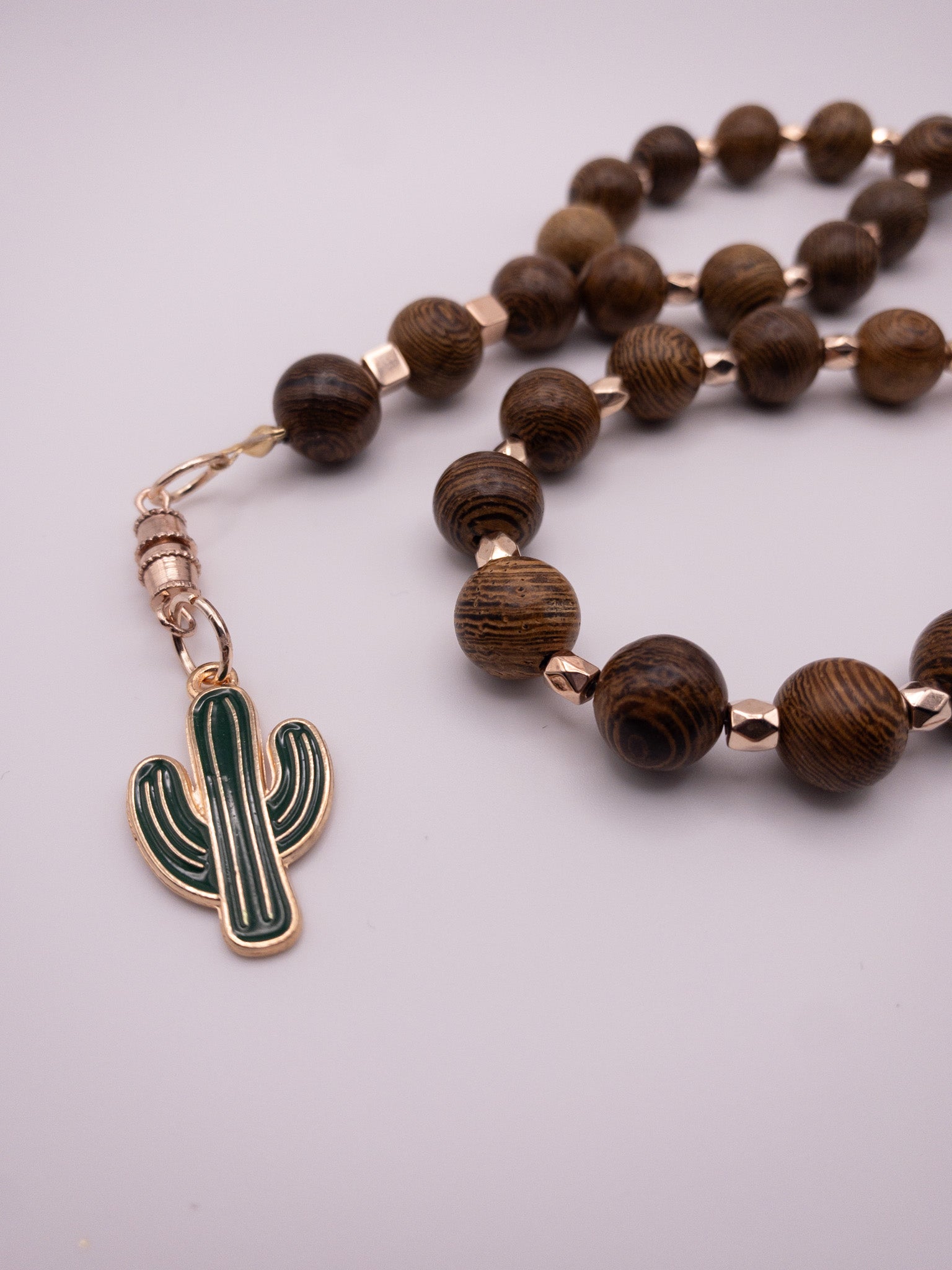 wooden sebha with cactus 