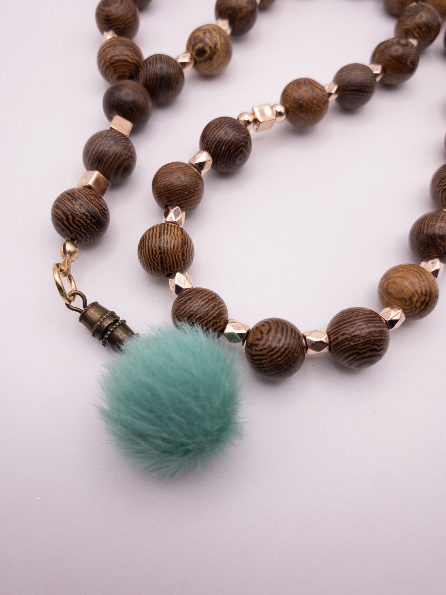 wooden sebha with turquoise pom pom