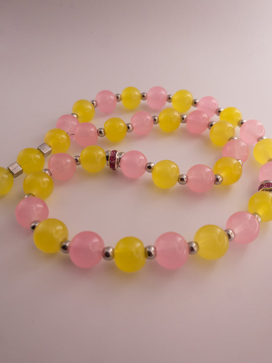 yellow and pink glass beads 